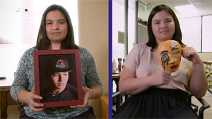 Katie Watanabe holds a picture of her brother (left) and a mask representing loss (right)