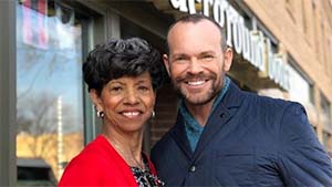 Mother Rose of Underground Books stands next to Rob Stewart.